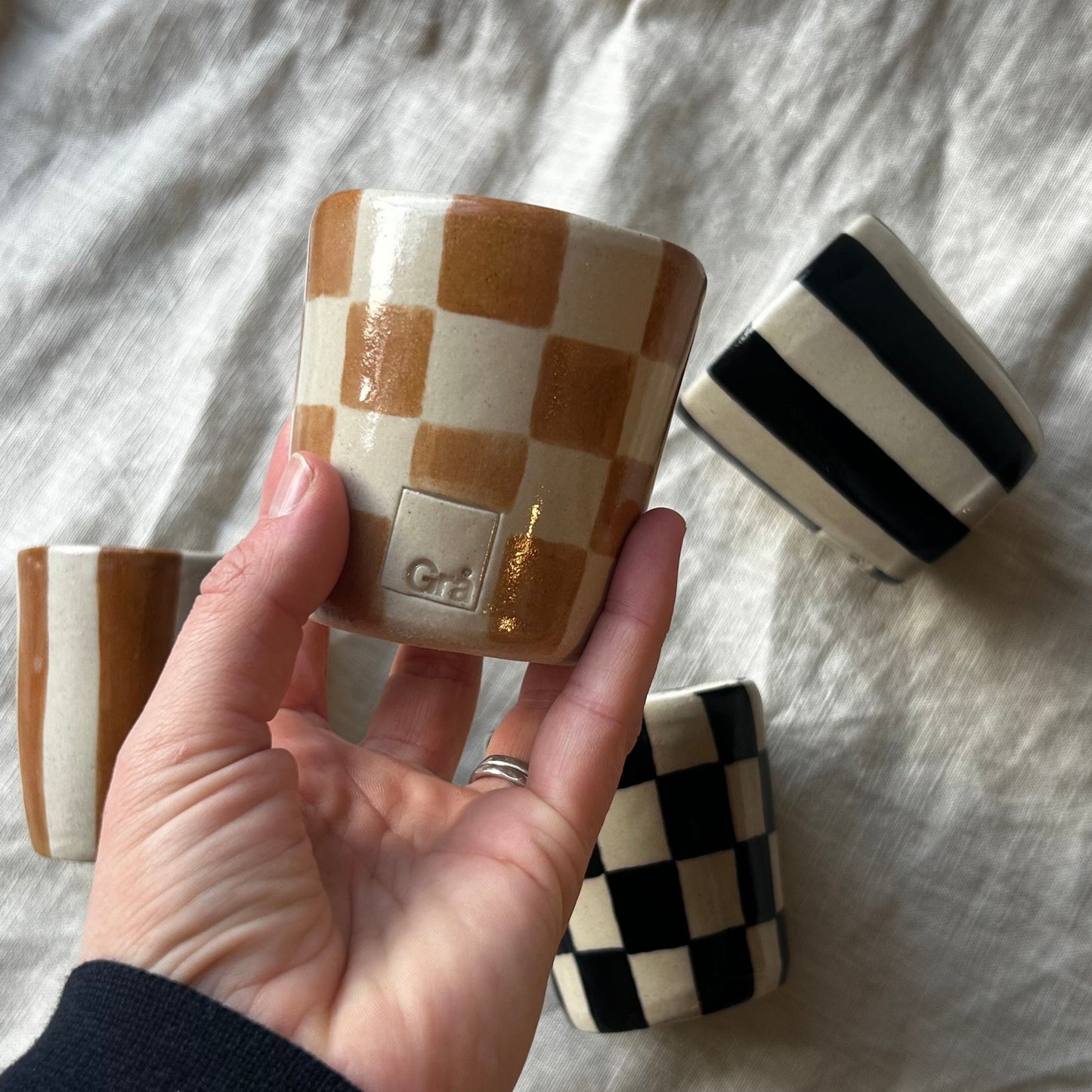 Form and Balance X Grä Design Ceramic Cup | Rust Checkered